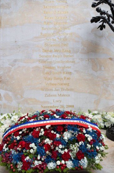 New Delhi: French President pays tribute to 26/11 victims at Mumbai's Taj Hotel