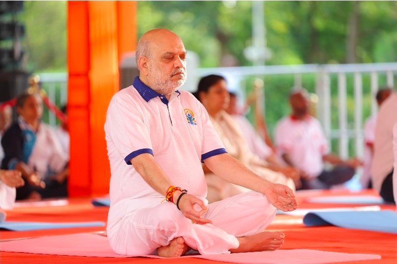 Ahmedabad: Shah practices yoga in Ahmedabad on International Yoga Day
